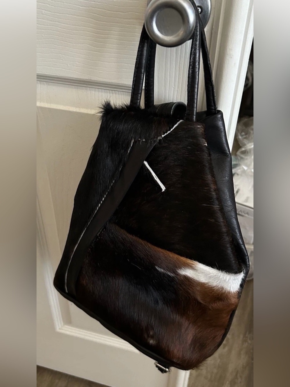 Leather & cowhide bag by Charlie Leather